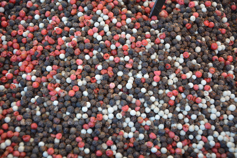 Three colors of peppercorns