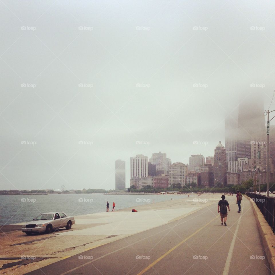 Chicago lakefront with cop car driving down it