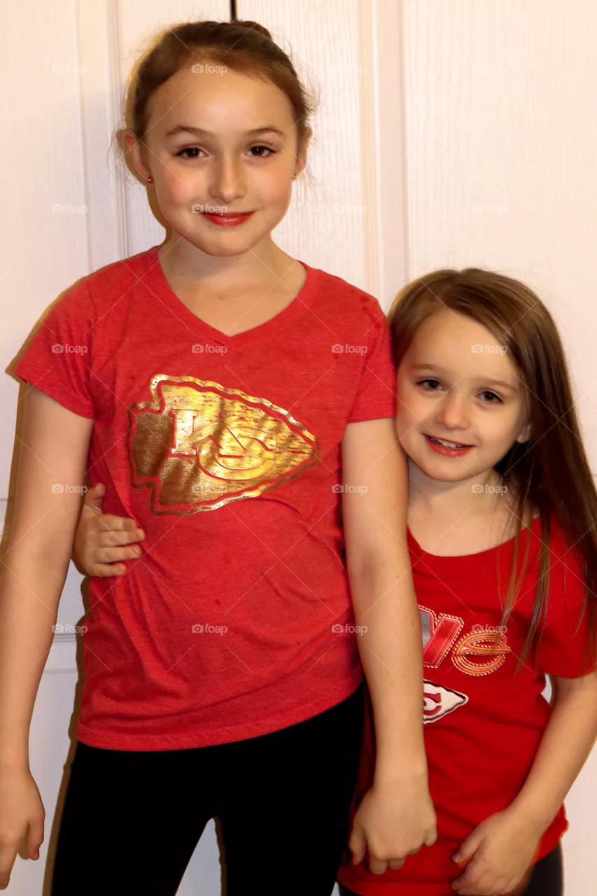 sister wearing red