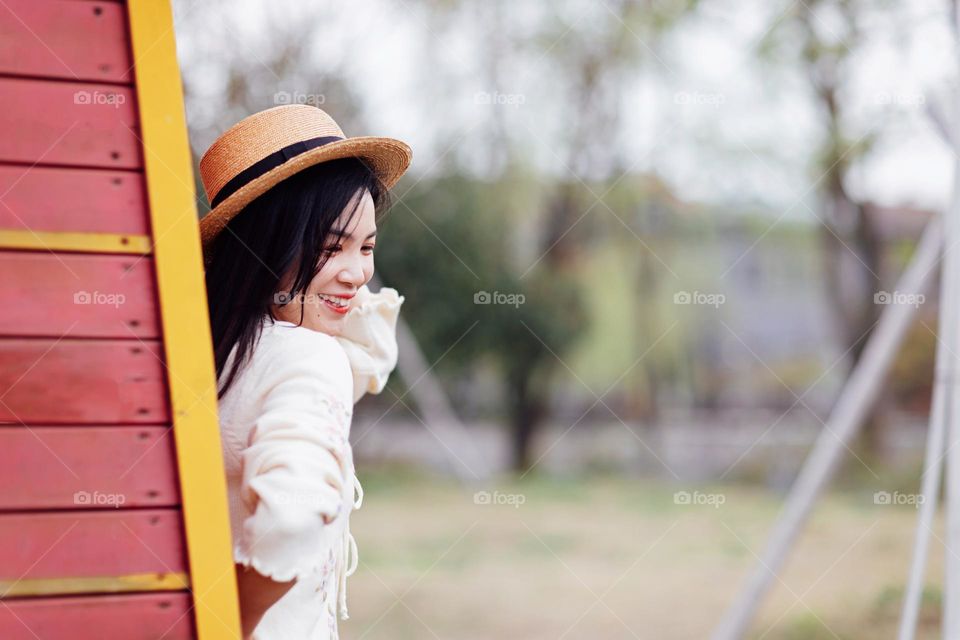 Lifestyle portrait of happy Asian woman 