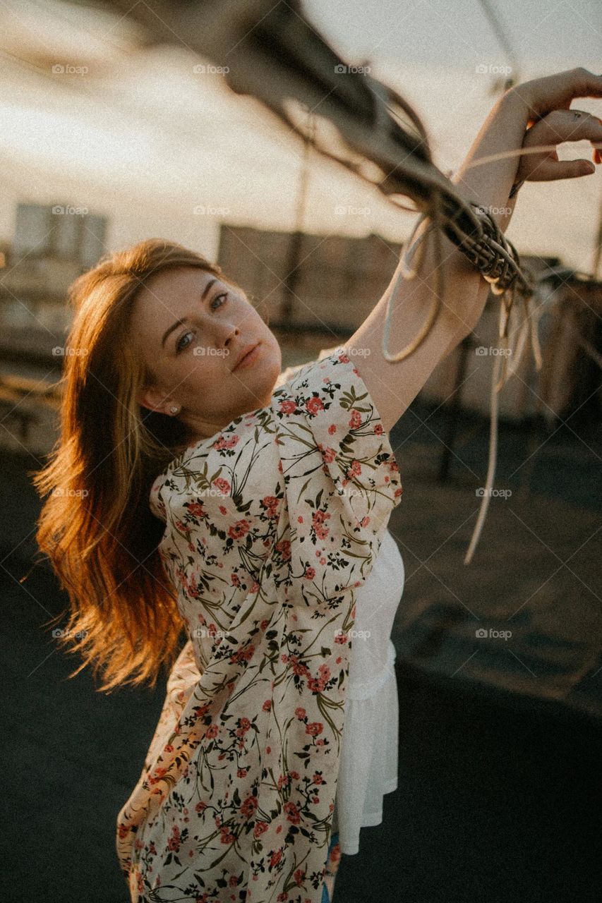 portrait of a beautiful girl at sunset