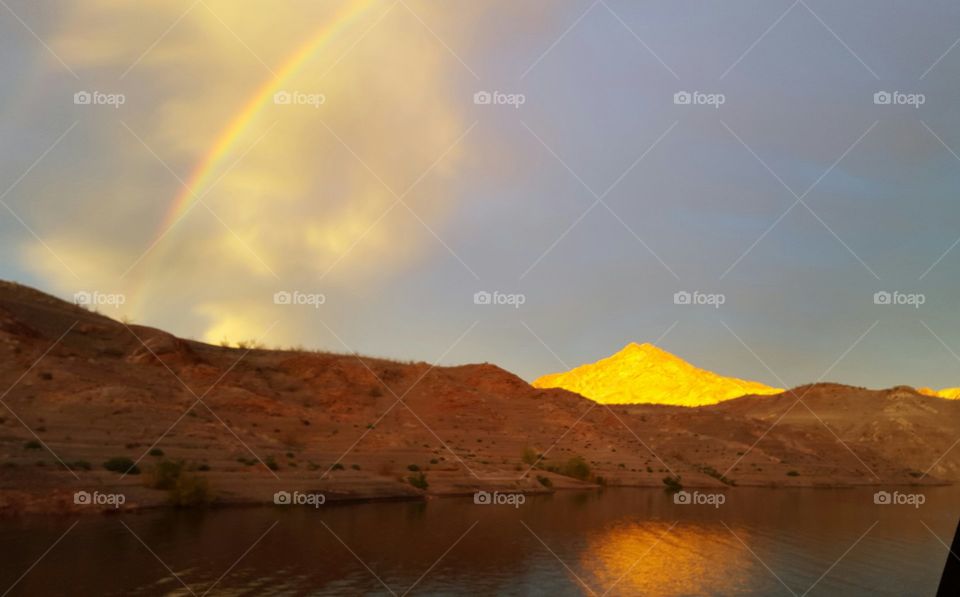 Rainbow at sunset on Lake Mead