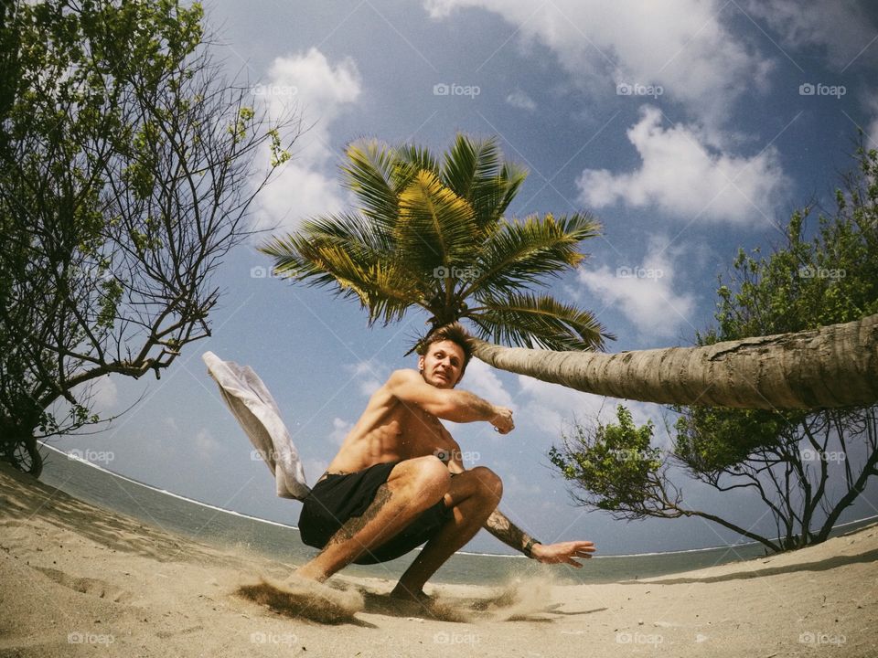 Low angle view of man at beach