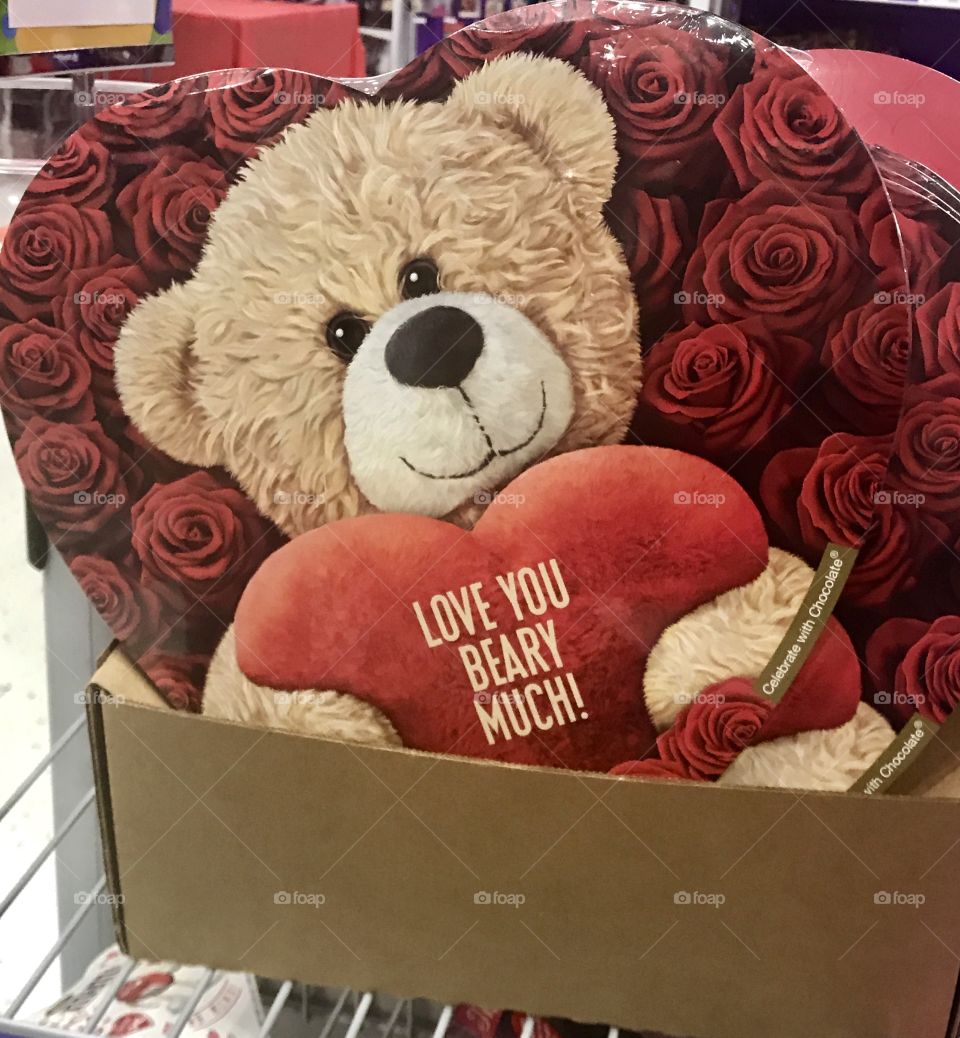 A cute valentines bear box of chocolates saying I love you very much . USA, America 