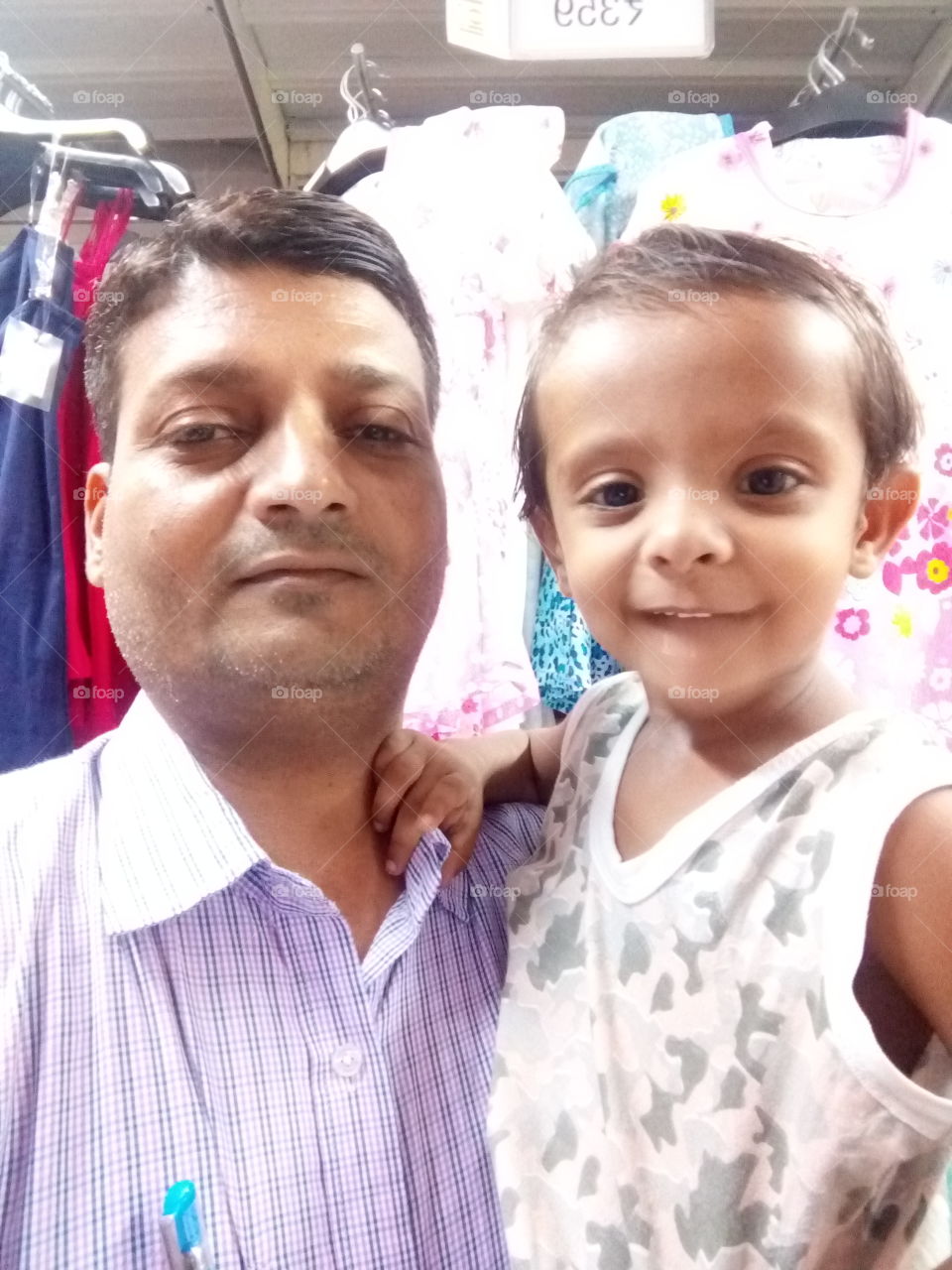 a little boy in happy mood giving pose