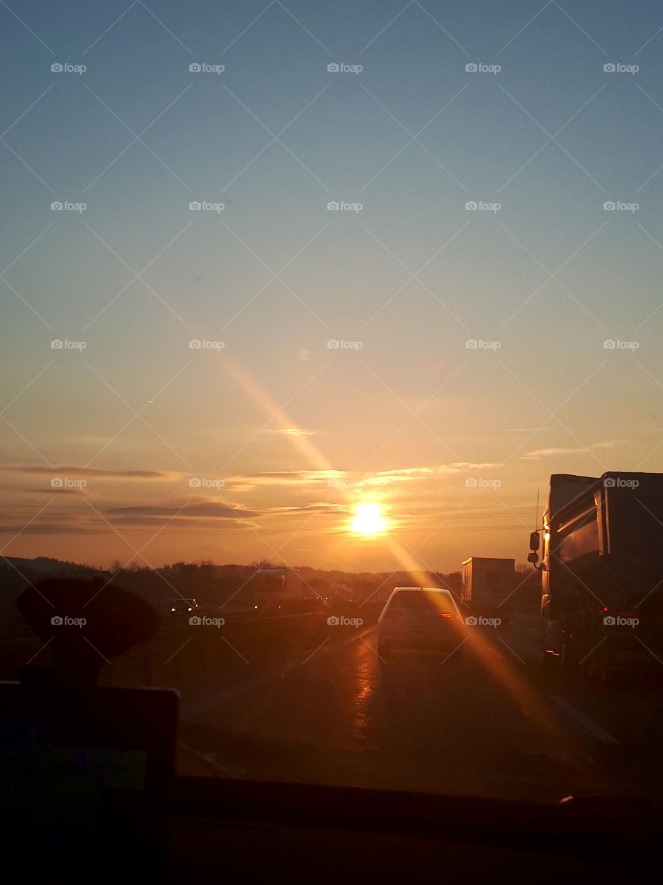 Highway ride by sunrise