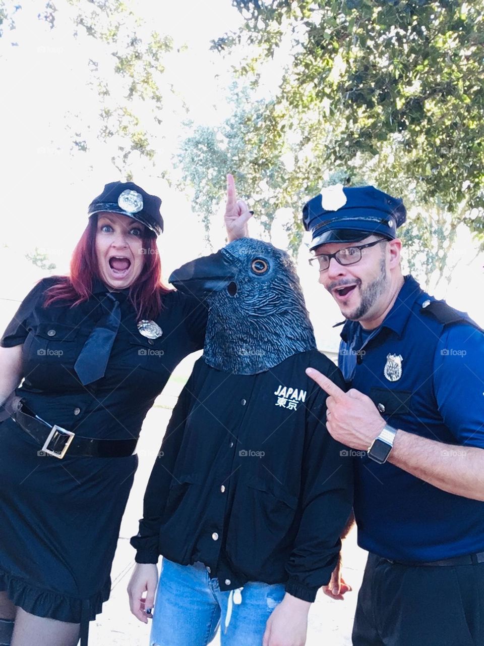 My family as Halloween cops and a jail bird 🦅