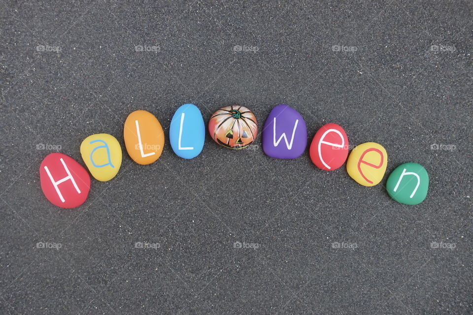 Halloween word with multi colored stones