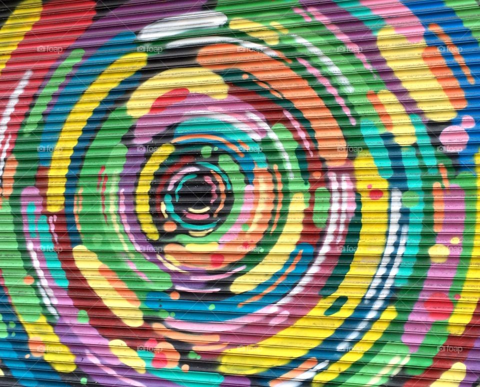 Spiral of colours on a garage door ... colourful artwork 