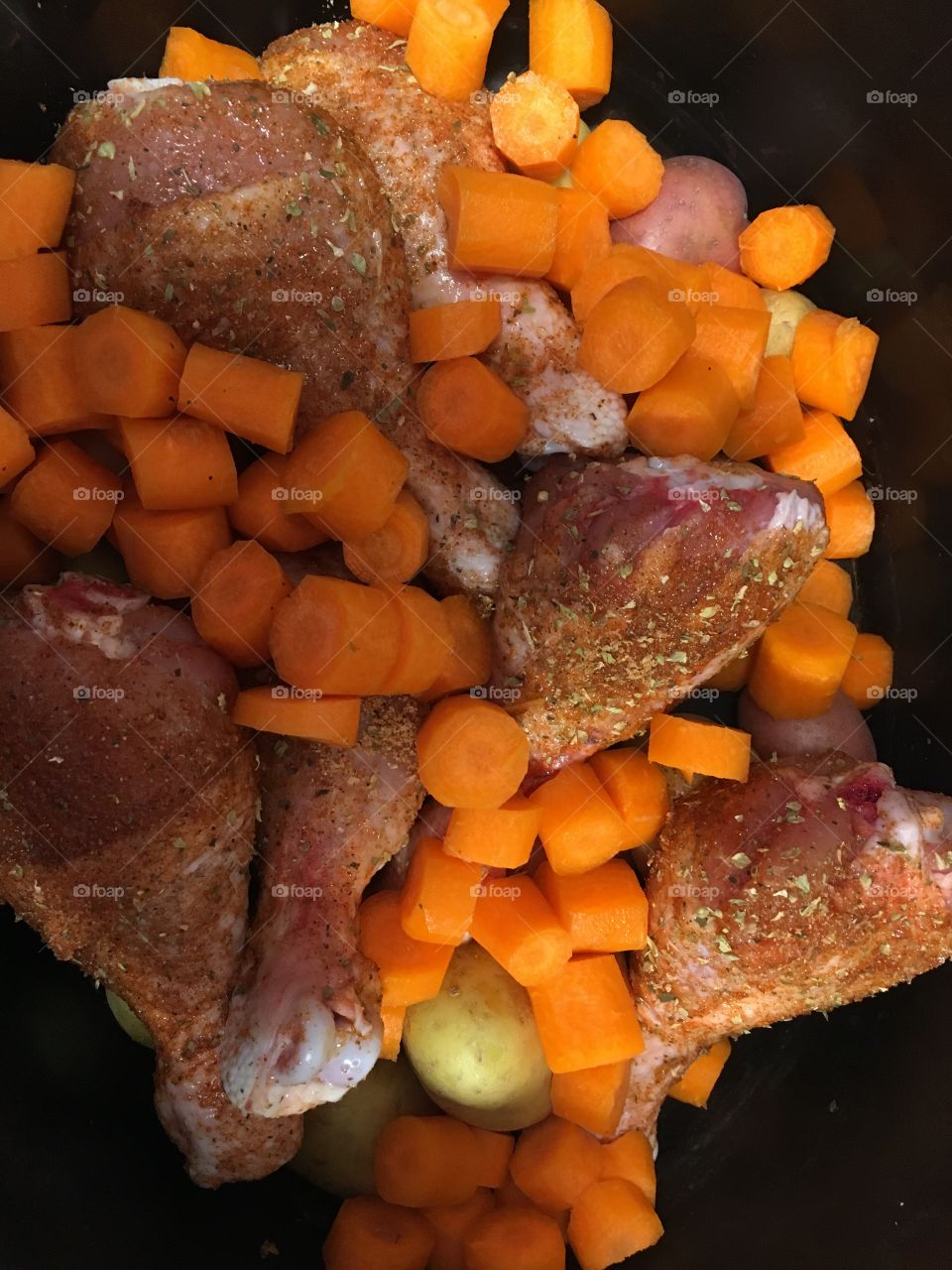 Chicken with carrots and potatoes in the slow cooker 