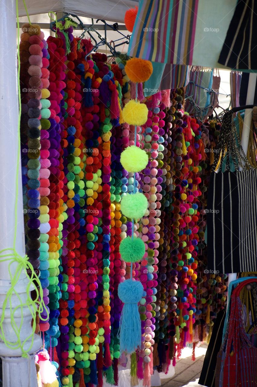 Pompoms at the hippie market in Sayulita.