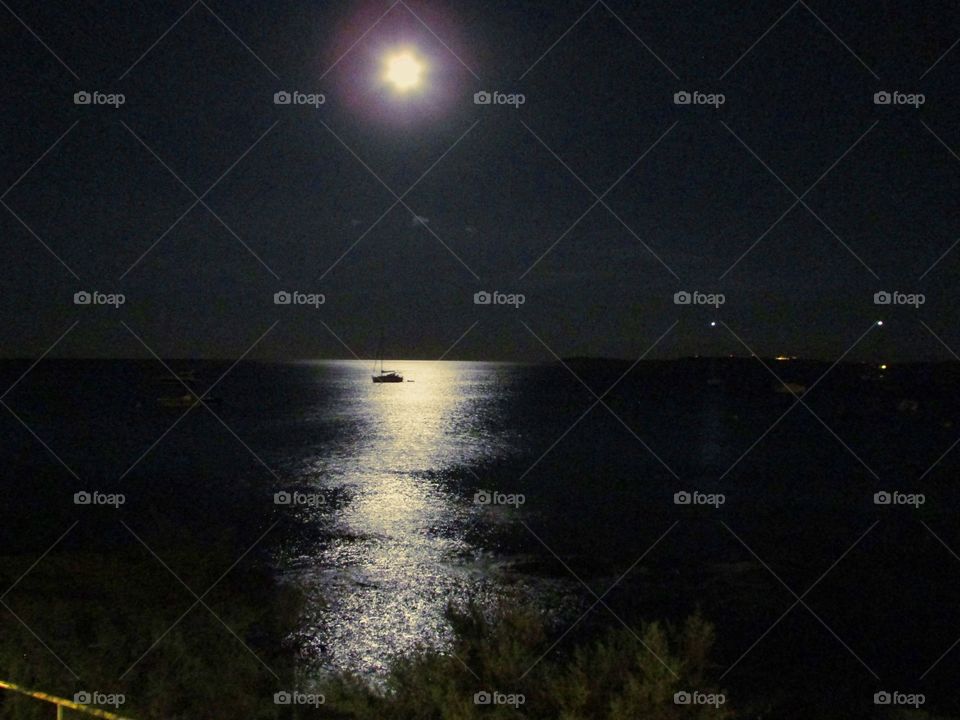 Moon reflection over the sea
