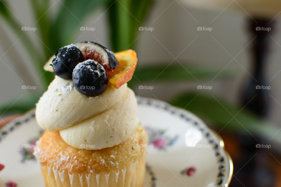 Fresh cupcake on plate