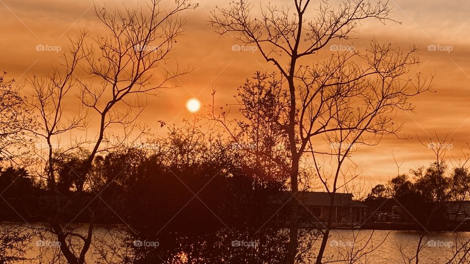Complete coverage of lake area by beautiful colorful clouds that moved in quickly 