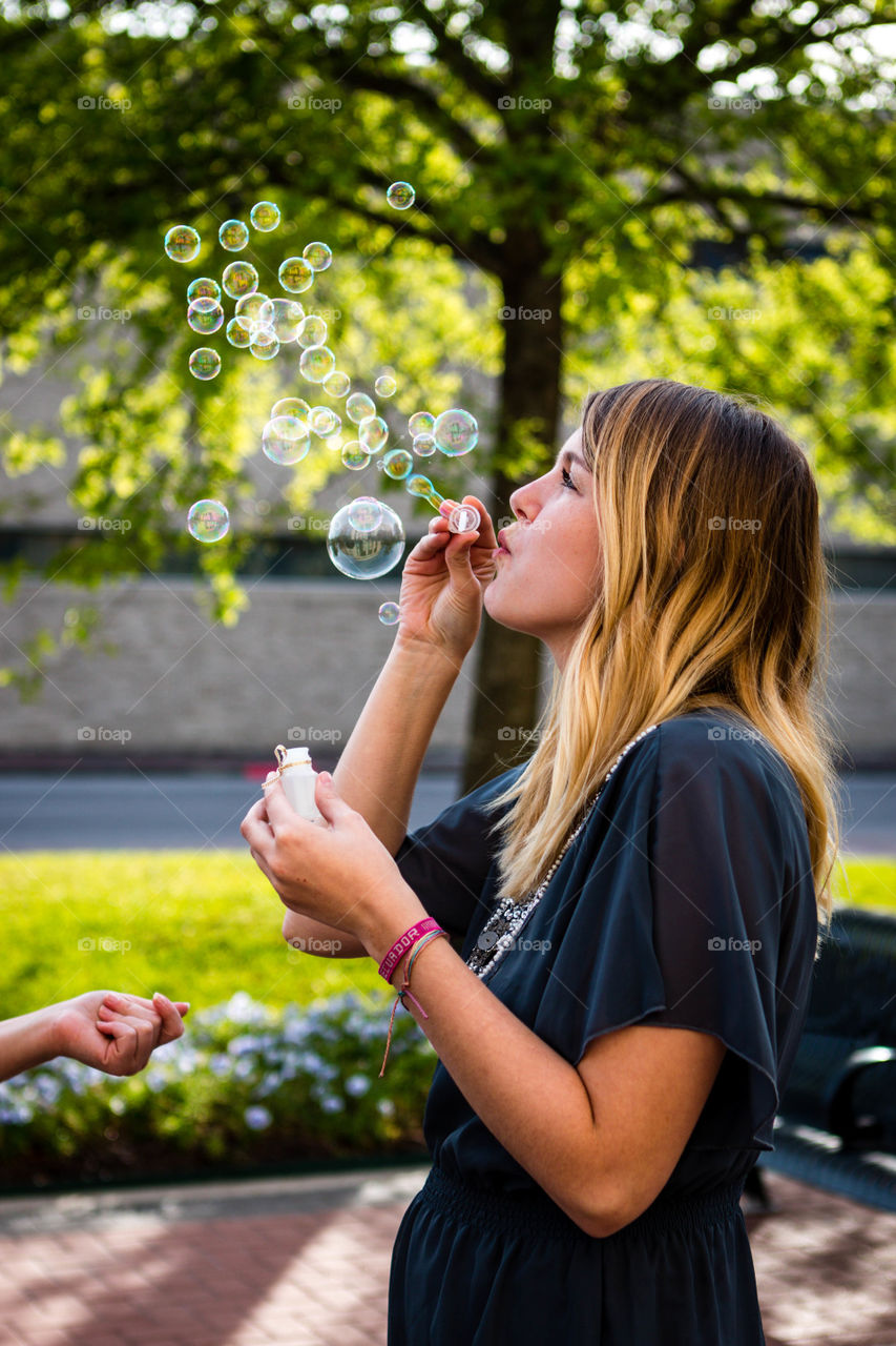 Lacey Blowing Bubbles
