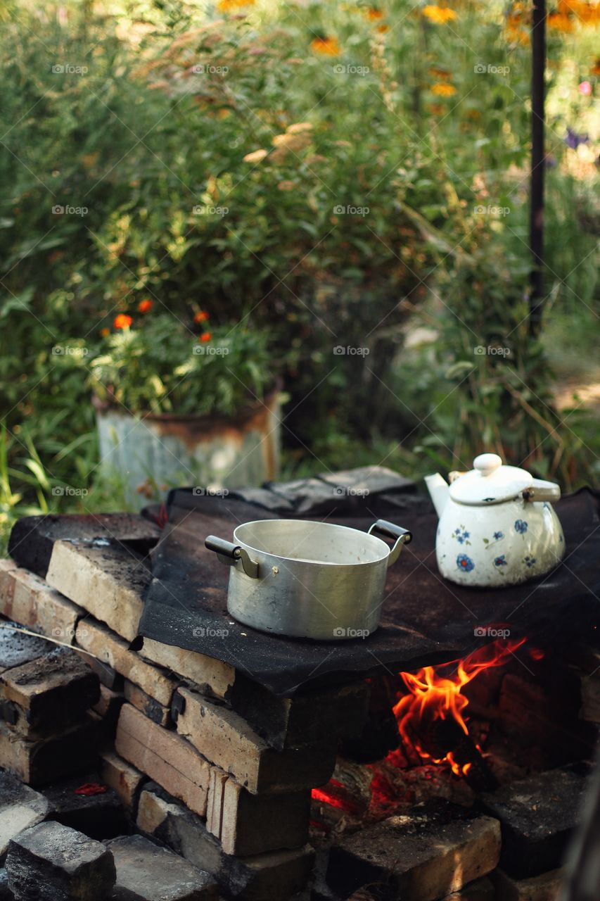 Tea and porridge cooked on a fire in the country