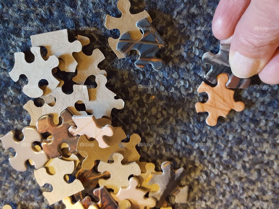 Person playing puzzle