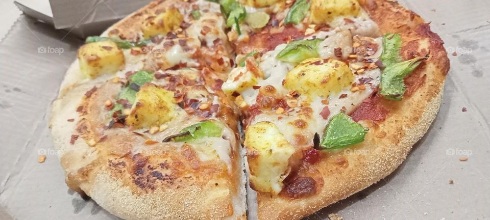 Pizza 🍕 is tasty and popular food. This is fast food. Available in restaurant and also home delivery. Pizza is available in different different categories.