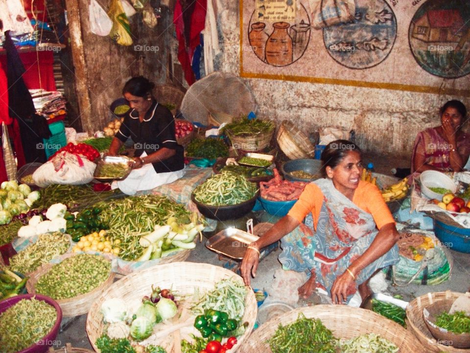 Women selling fresh vegetables in the market 