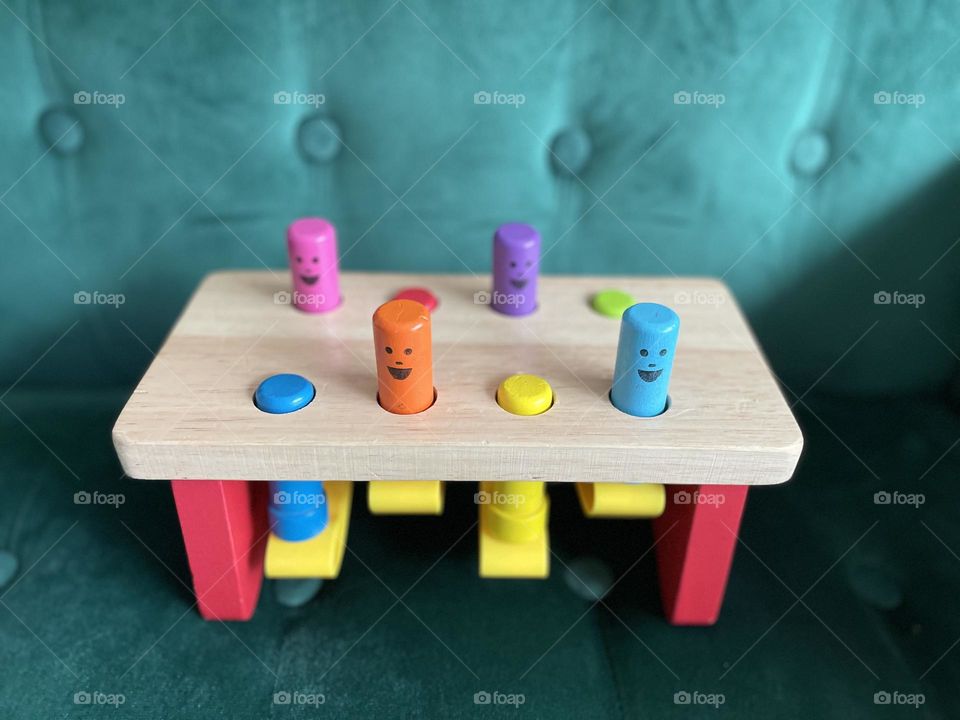 Toddler pounding toy, toddler wooden Melissa and Doug toy, infant toys, toddler toy on a velvet couch, wooden colorful pounding toy for toddlers, fun toys for children