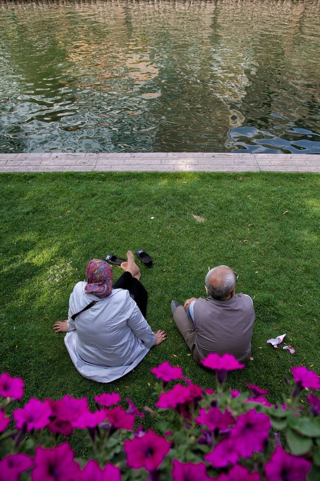 city woman grass river by olb
