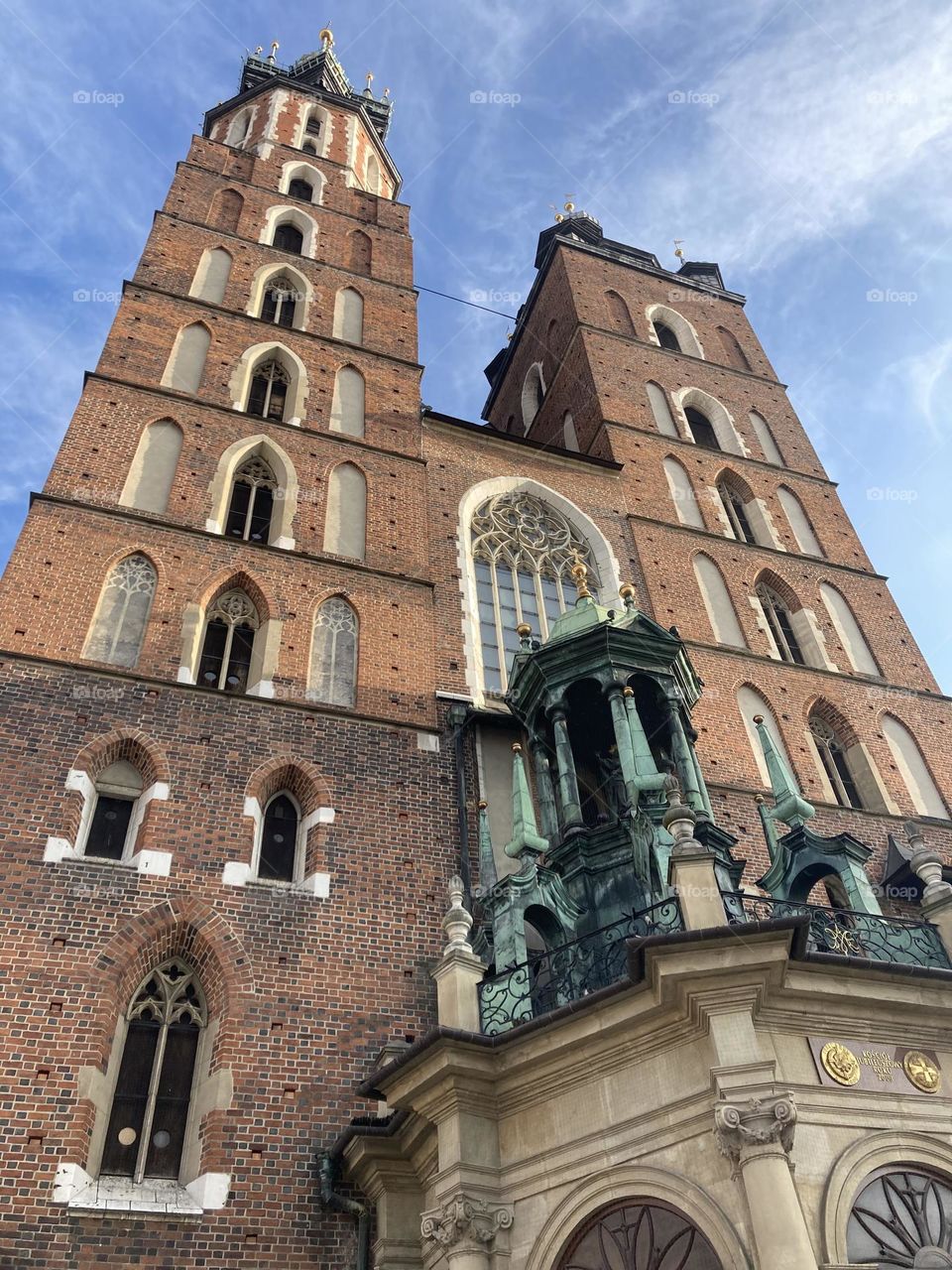 Charming streets of Kraków. Sunny day in Kraków Poland. Lovely walk in the city. Day trip. Discover new places. Time for adventure. Cold day in the winter. Sightseeing the city by walk. Famous buildings and landmarks. Church 