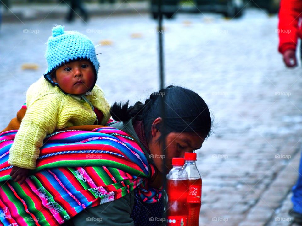 A peruvian baby with his mother 