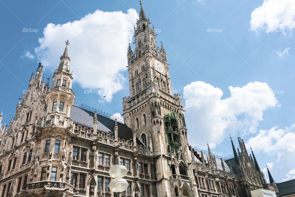 Bell tower of a church in Monaco of Bavaria. Check through the trees.