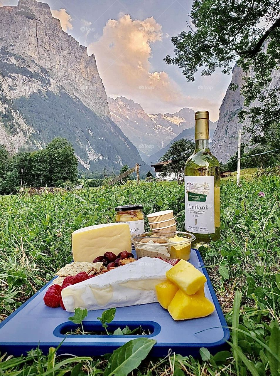 A sunset wine and cheese picnic just off the bike path in Lauterbrunnen, Switzerland 