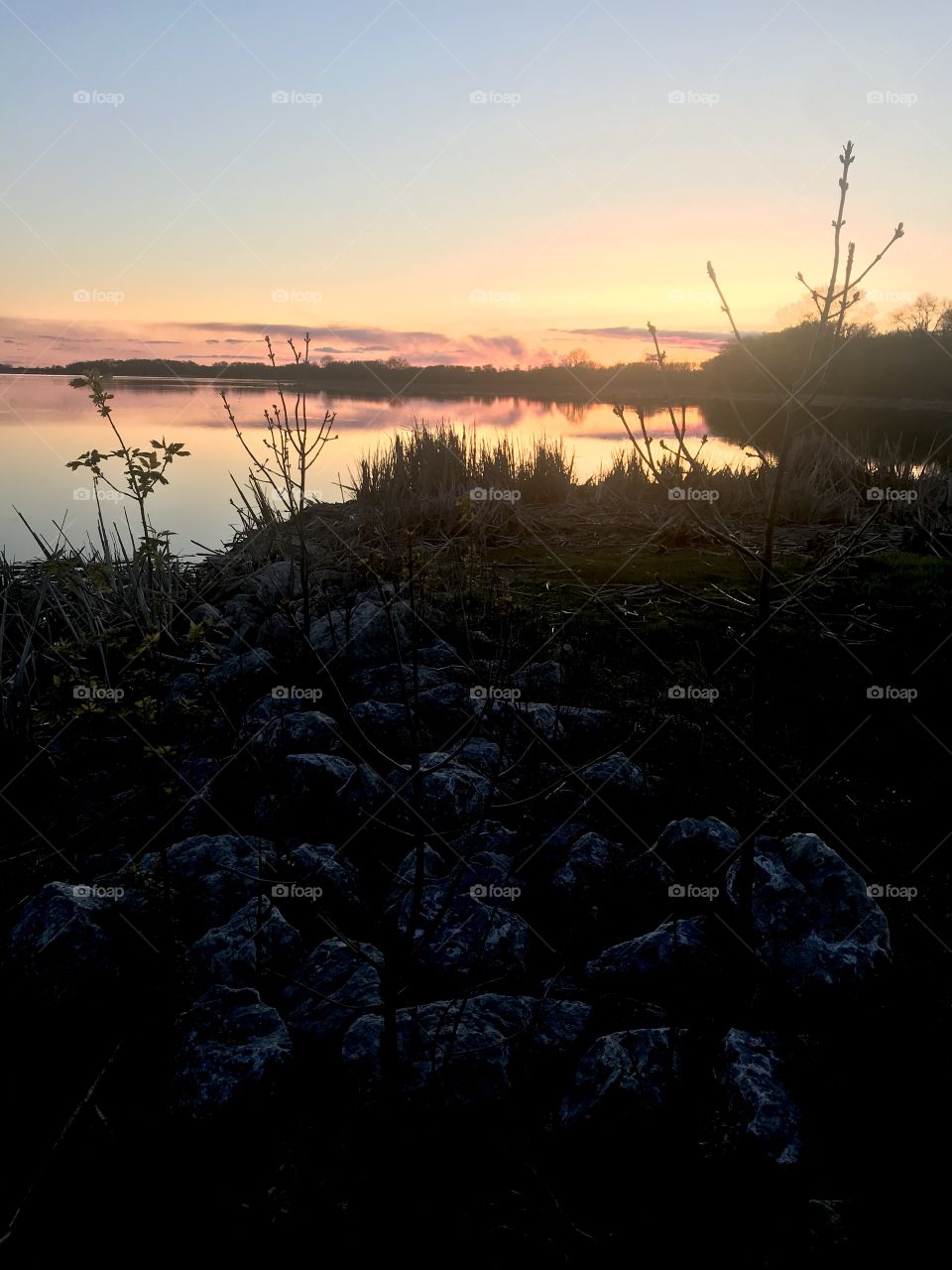 Gorgeous night in this small town beach area with sun setting below the horizon. 