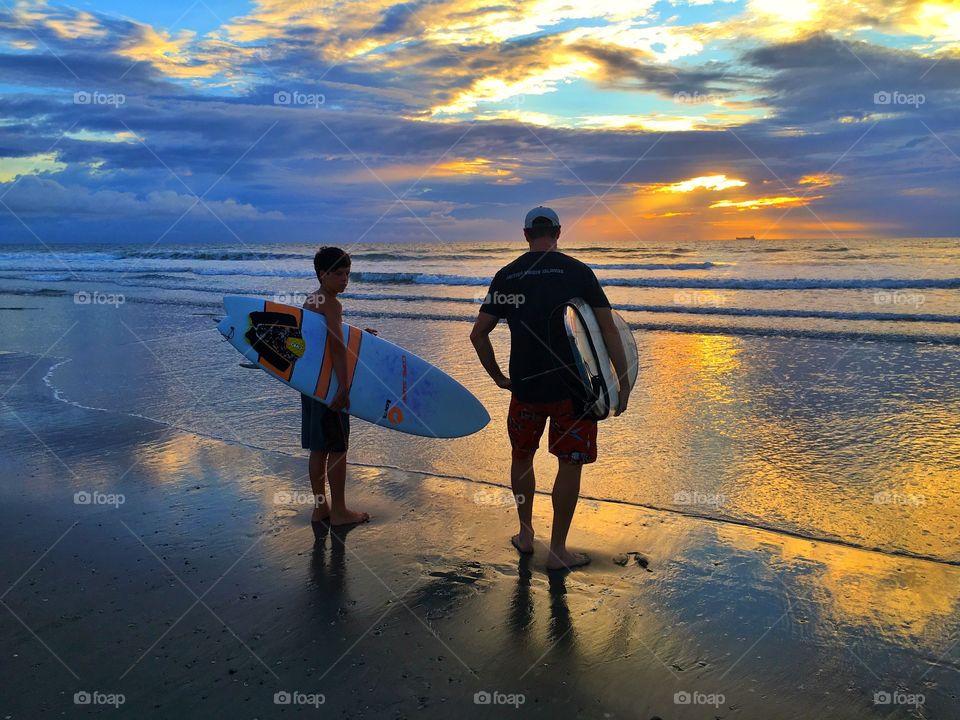 Surfer dad and son