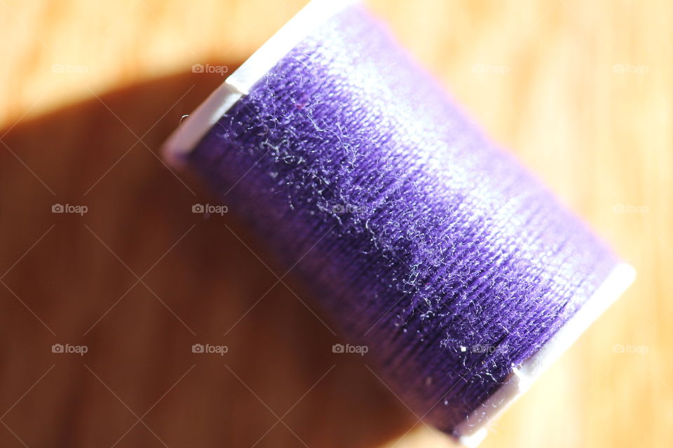 High angle view of purple thread