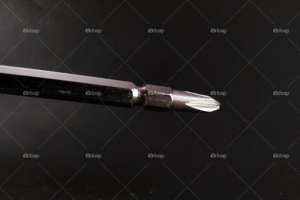 screwdriver with phillips head, isolated on black background