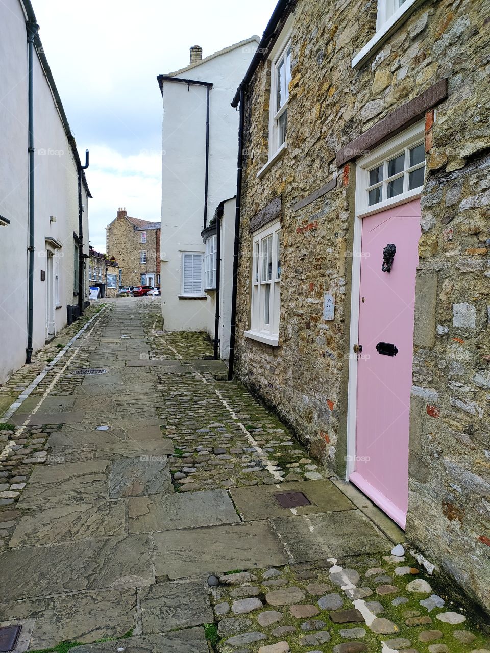 street with a pink door ; england