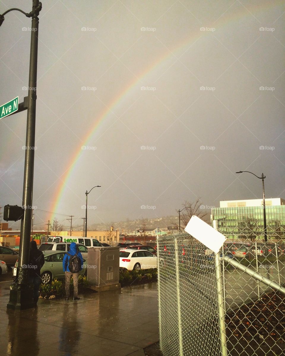 Rainbow over traffic in Seattle