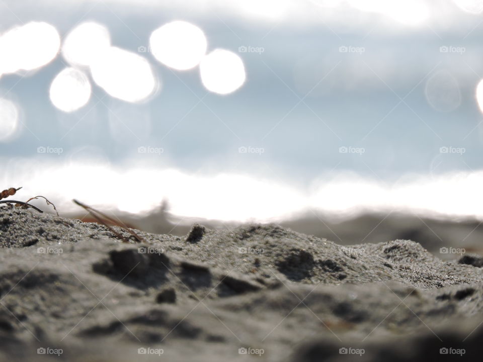 Up close view of sand on a private beach.