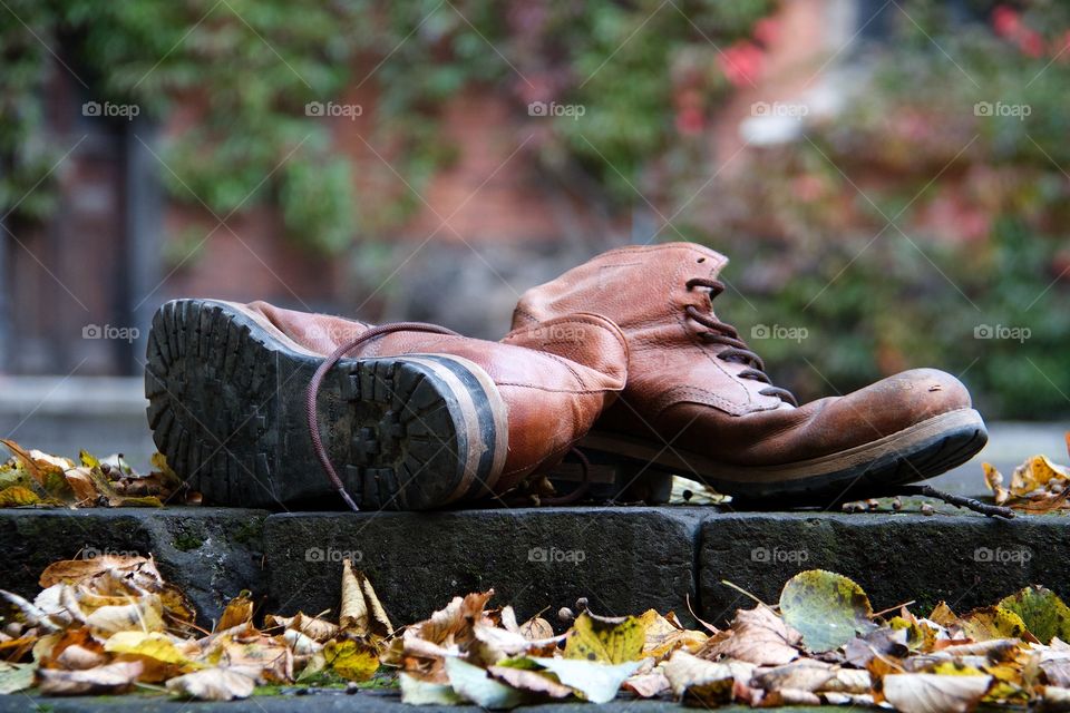 Boots and autumn background