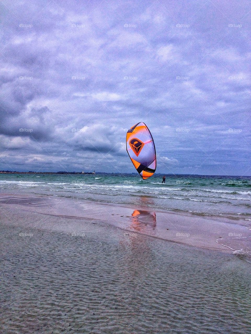 Kite surfer with reflection 