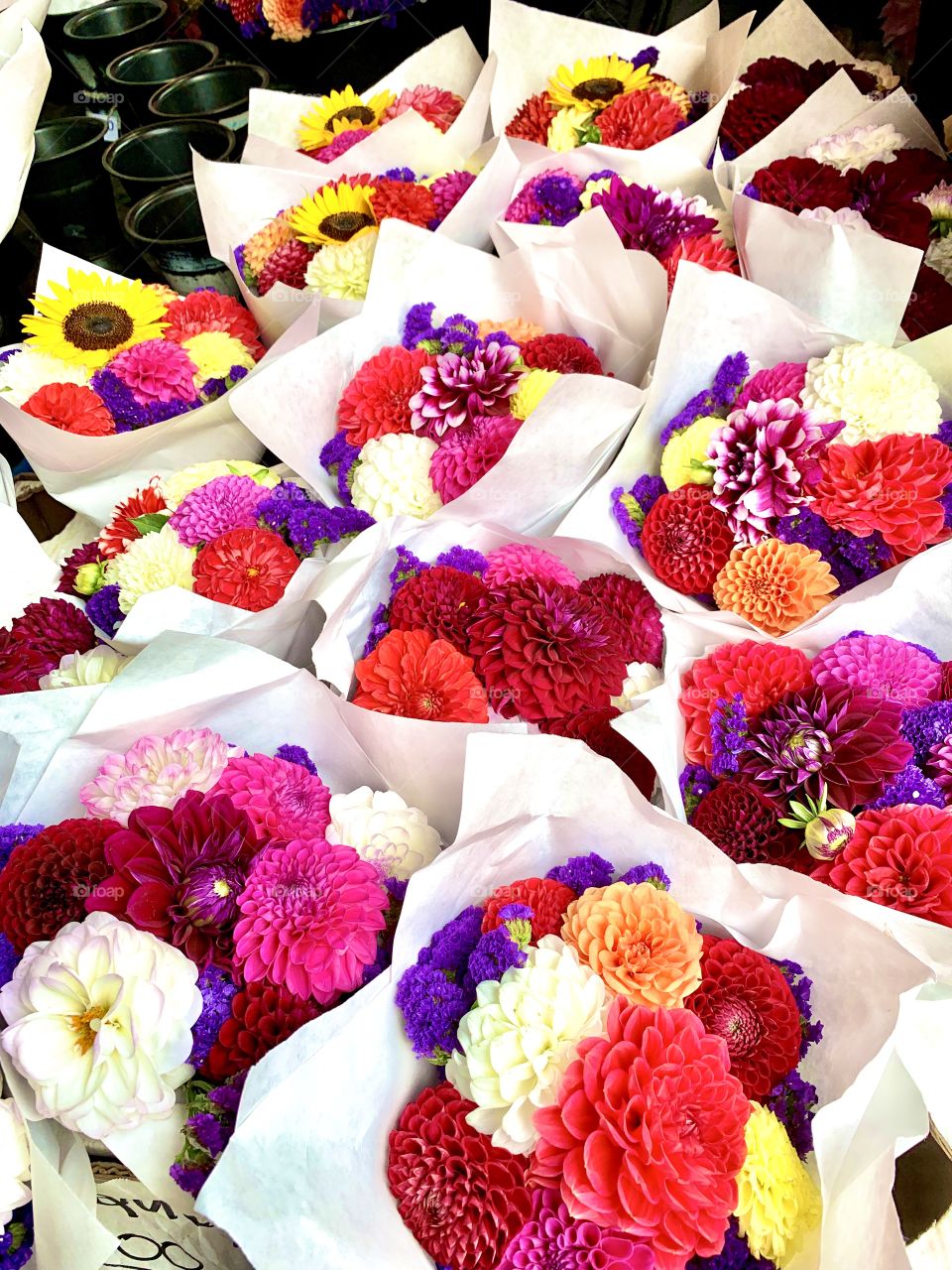 Vibrant bouquets of flowers at a farmers market in Seattle, WA.