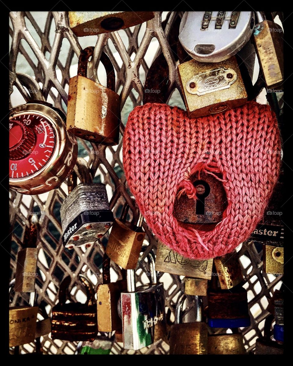 Locks of love, love locks on a bridge, locks on a bridge in the Caribbean, lock with knitting on it, unusual locks 