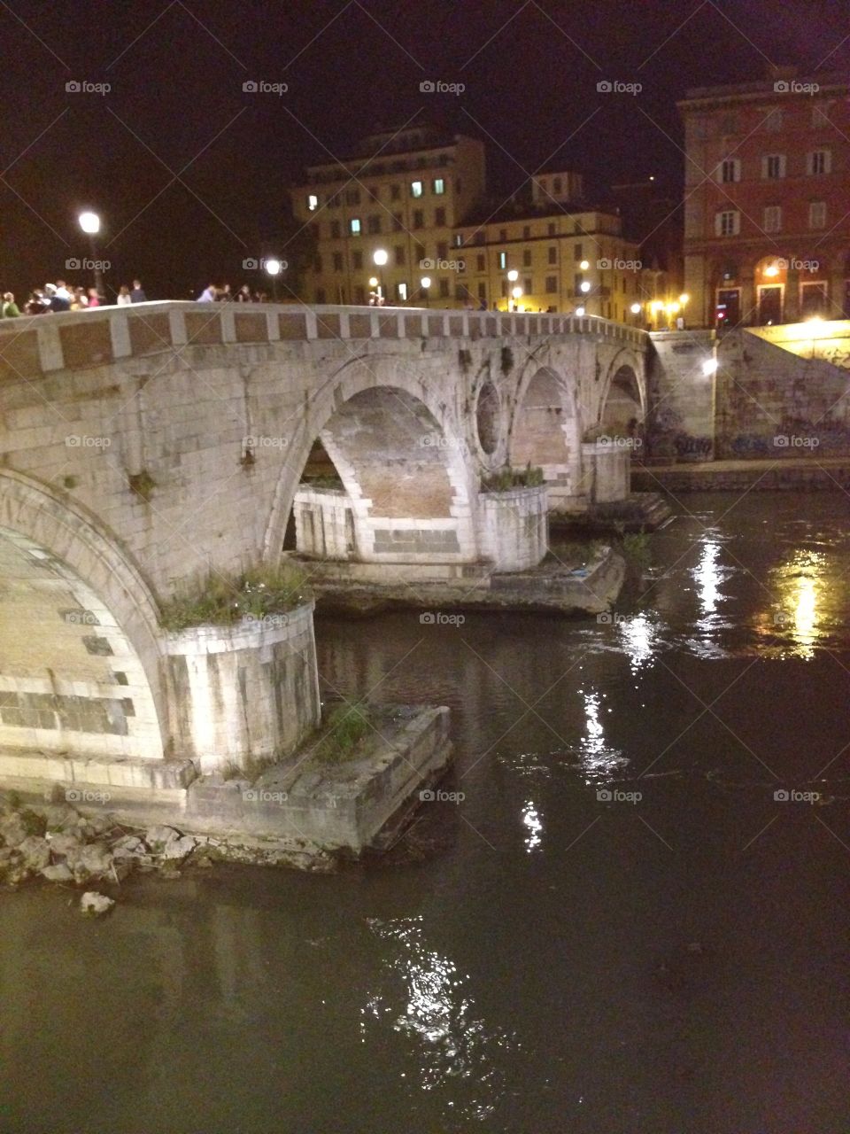 Fun . Walking at night through ponte sisto 