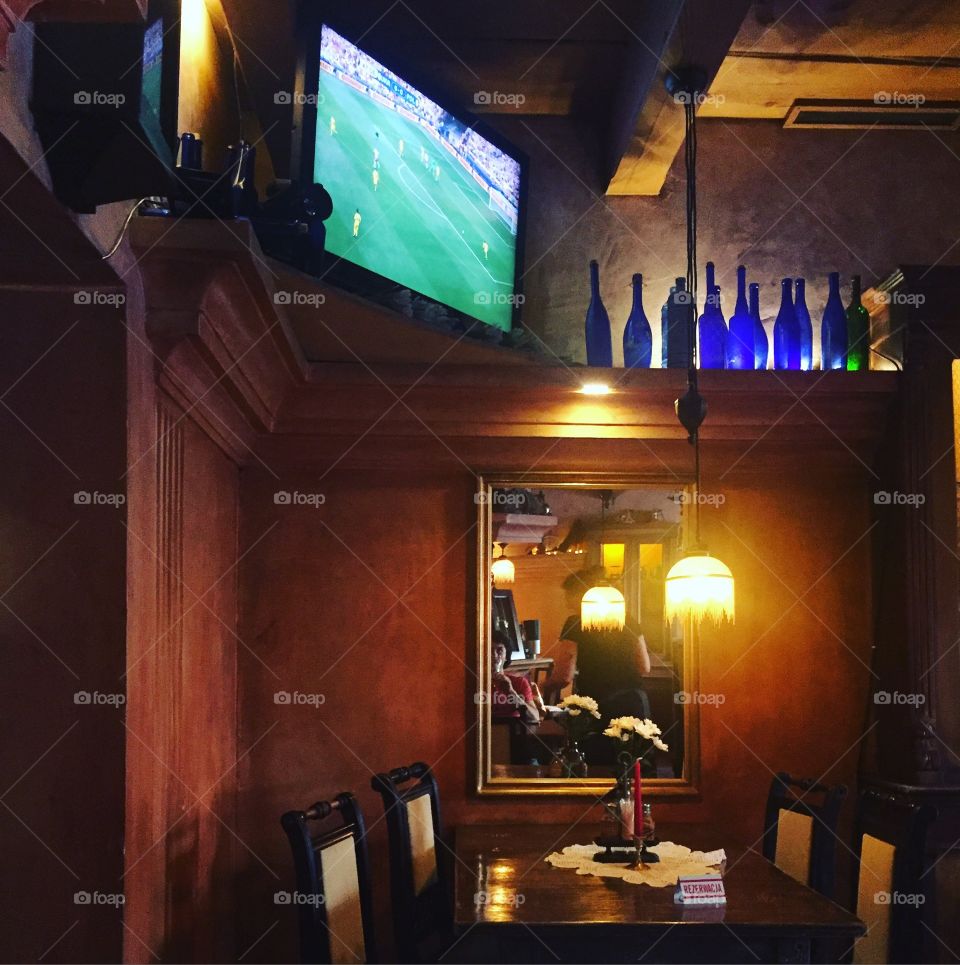 Watching footbal in a restaurant 