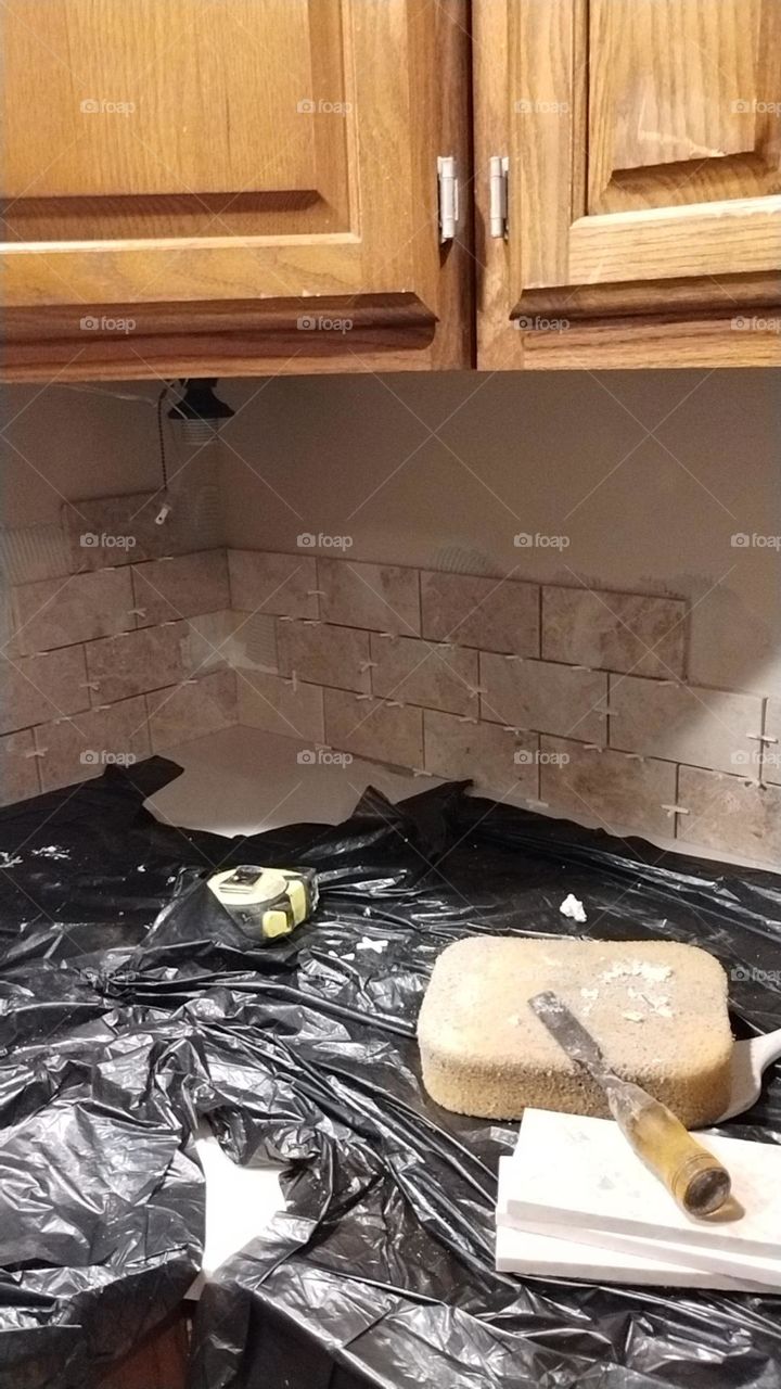 tile backsplash
backsplash of ceramic
ceramic tile job
ceramic tile spacers
1/8 tile spacers
kitchen backsplash