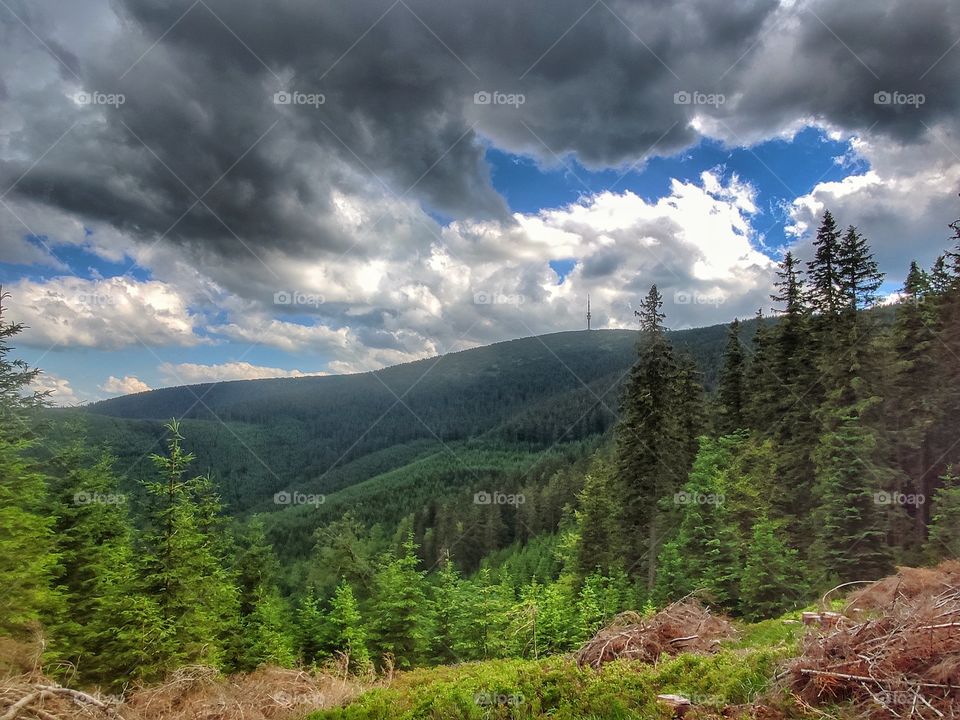 clouds over the hills