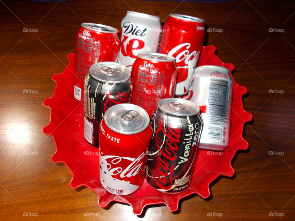 Grab a Coke from the bottle cap bowl