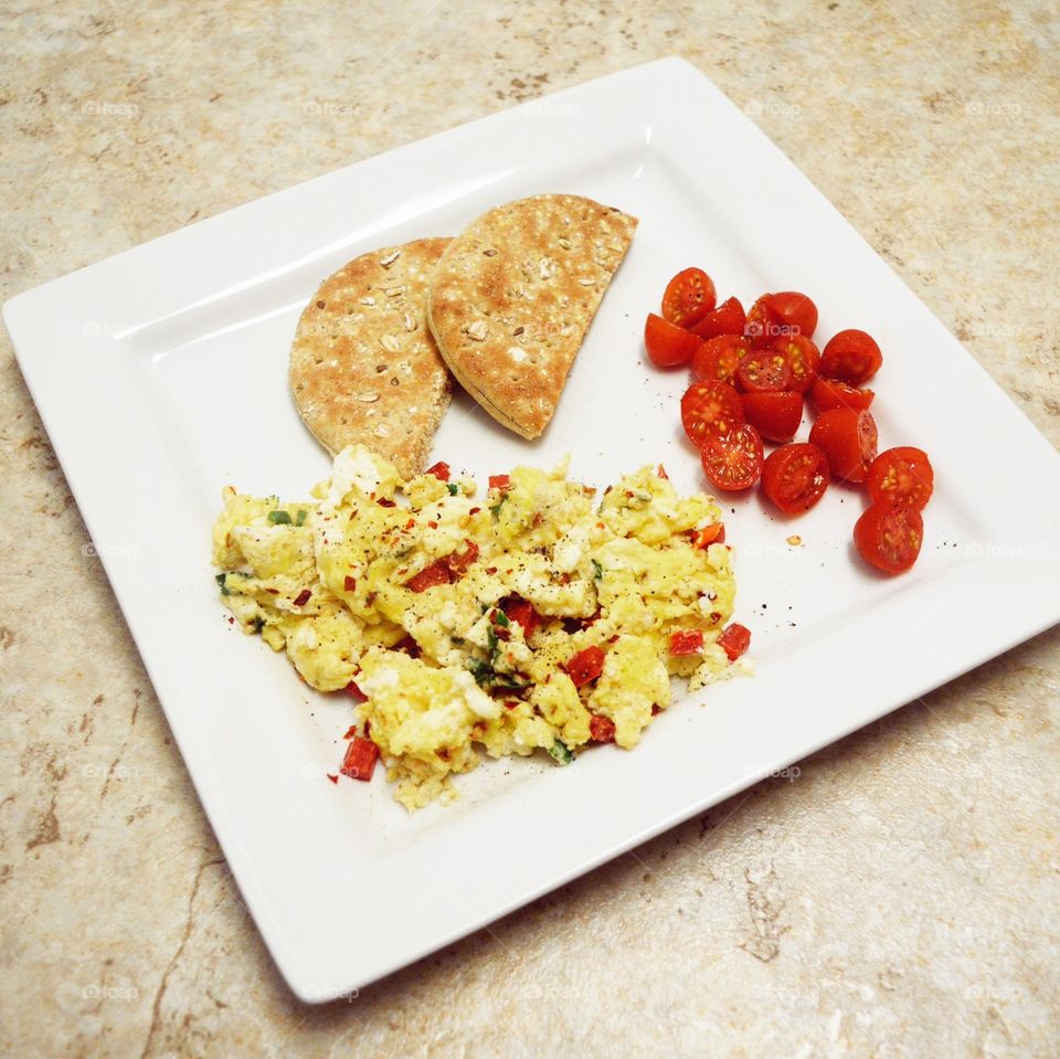 Scrambled Eggs, Tomatoes and Thin Wheat Bread