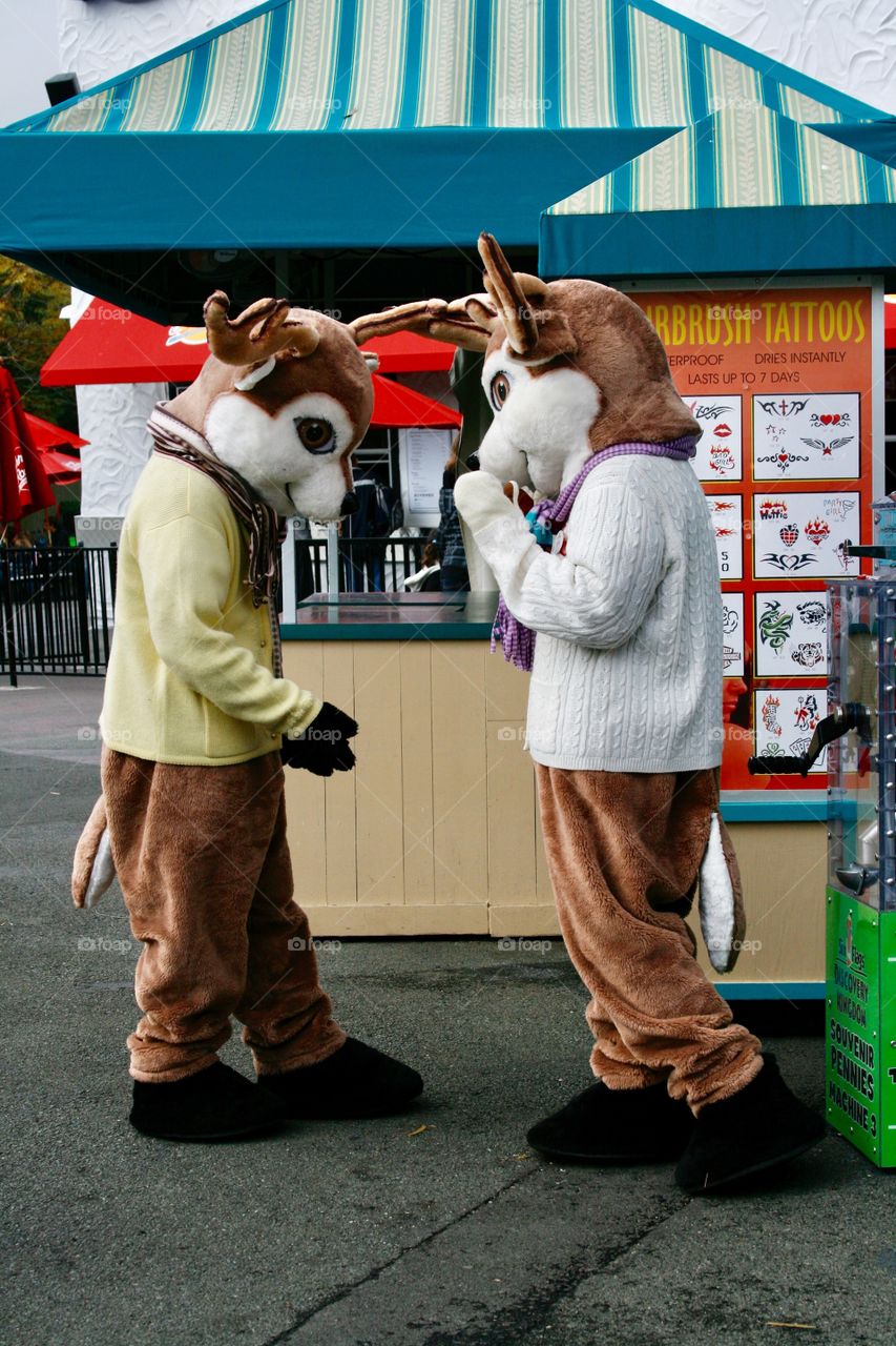 People wearing deer costumes