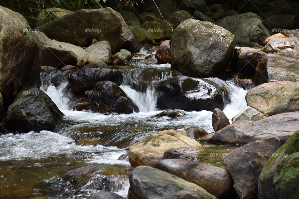 river flows through rocks