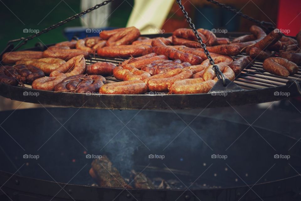 View of meat on barbecue grill