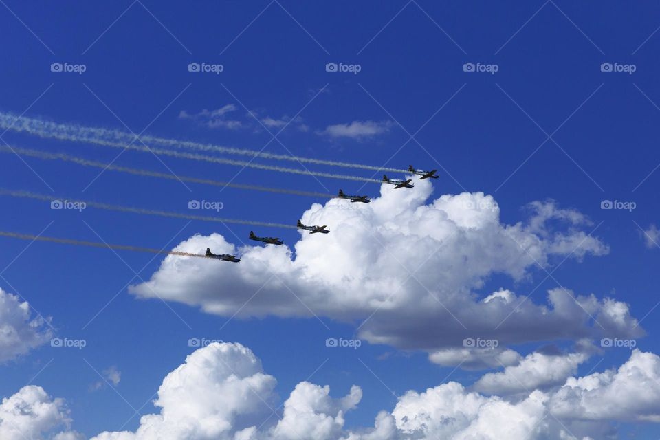 Airplanes, blue sky and clouds.